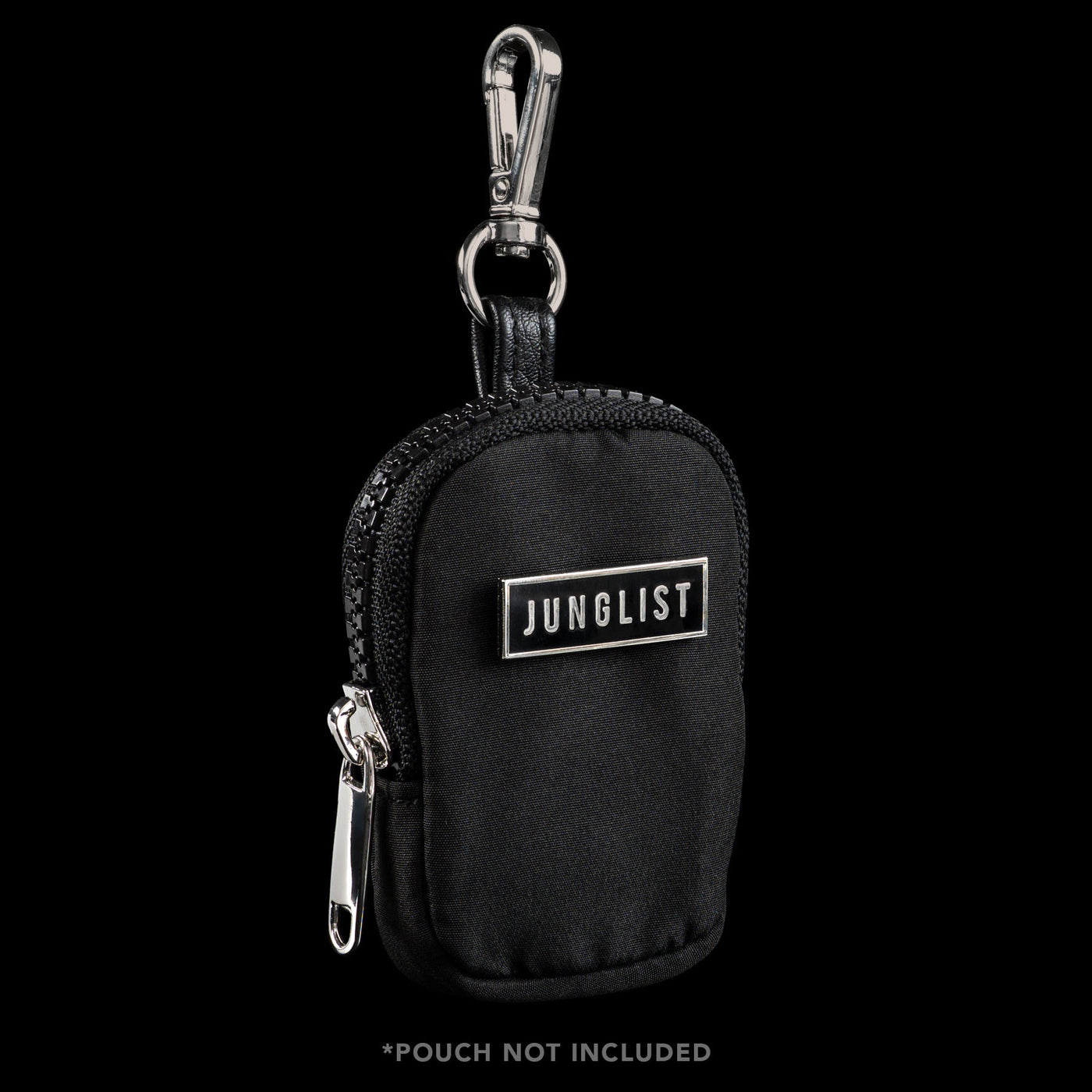 Front View of Small Rectangular Silver Metal Pin with Black Enamel Face, fastened to a small Black Pouch With Silver keychain and Zipper Pull. Text on front of pin reads, J-U-N-G-L-I-S-T. 