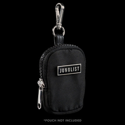 Front View of Small Rectangular Silver Metal Pin with Black Enamel Face, fastened to a small Black Pouch With Silver keychain and Zipper Pull. Text on front of pin reads, J-U-N-G-L-I-S-T. 